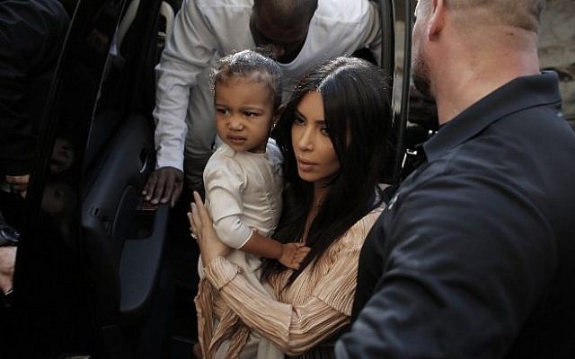 US reality TV star Kim Kardashian, her daughter North West and husband, rapper Kanye West, spent quality time in Jerusalem this week (photo credit: AFP/Ahmad Gharabli)