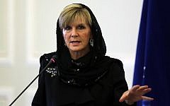 Australian Foreign Minister Julie Bishop holds a press conference with her Iranian counterpart Mohammad Javad Zarif following a meeting in Tehran on April 18, 2015. Some commentators are criticizing Bishop's headscarf as acquiescing to Iranian modesty laws, against Western values. (Photo credit: Atta Kenare/AFP)