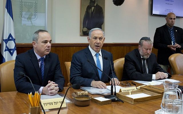 Prime Minister Benjamin Netanyahu (C) talks to the press during the weekly cabinet meeting in his Jerusalem office, on April 19, 2015 (photo credit: AFP/POOL/MENAHEM KAHANA) Prime Minister Benjamin Netanyahu (C) talks to the press during the weekly cabinet meeting in his Jerusalem office, on April 19, 2015 (photo credit: AFP/POOL/MENAHEM KAHANA)