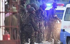 Kenya Defense Forces are pictured after they ended a siege by gunmen in the university on April 2, 2015 in the northeastern town of Garissa. (photo credit: AFP PHOTO / CARL DE SOUZA)