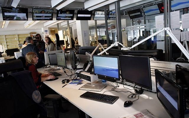 A picture taken on April 9, 2015 shows an empty newsroom at French television network TV5Monde headquarters in Paris, after TV5Monde was hacked by individuals claiming to belong to the Islamic State group. (photo credit: AFP/Thomas Samson) A picture taken on April 9, 2015 shows an empty newsroom at French television network TV5Monde headquarters in Paris, after TV5Monde was hacked by individuals claiming to belong to the Islamic State group. (photo credit: AFP/Thomas Samson)