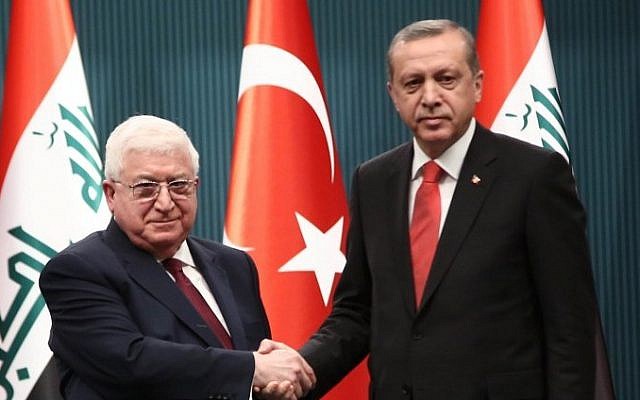 Turkish President Recep Tayyip Erdogan shakes hand with President of Iraq Fouad Massoum before a press conference in Ankara, on April 22, 2015. (Photo credit: AFP/ STR) Turkish President Recep Tayyip Erdogan shakes hand with President of Iraq Fouad Massoum before a press conference in Ankara, on April 22, 2015. (Photo credit: AFP/ STR)