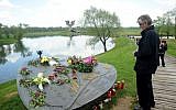 A man looks at the World War II Jasenovac memorial camp model on April 26, 2015, during a ceremony to remember the tens of thousands who were killed by Croatia's pro-Nazi regime. (AFP/Stringer)