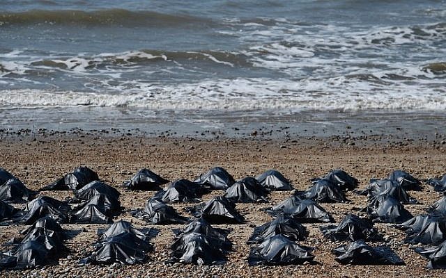 'Body bags' appear on Brighton beach in southern England, on April 22, 2015, in a display by Amnesty International to highlight what they claim is Britain's shameful response to the refugee and migrant crisis in the Mediterranean. (Ben Stansall/AFP) 'Body bags' appear on Brighton beach in southern England, on April 22, 2015, in a display by Amnesty International to highlight what they claim is Britain's shameful response to the refugee and migrant crisis in the Mediterranean. (Ben Stansall/AFP)