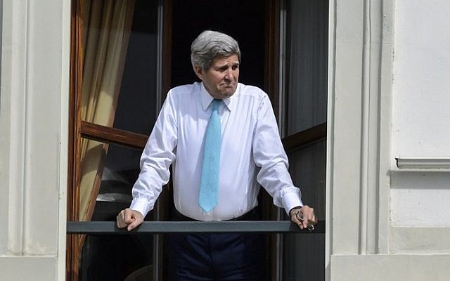 US Secretary of State John Kerry looks out of the window of his room at the Beau-Rivage Palace hotel during a break in Iran nuclear talks in Lausanne, Switzerland, on April 1, 2015. (photo credit: AFP / FABRICE COFFRINI) US Secretary of State John Kerry looks out of the window of his room at the Beau-Rivage Palace hotel during a break in Iran nuclear talks in Lausanne, Switzerland, on April 1, 2015. (photo credit: AFP / FABRICE COFFRINI)