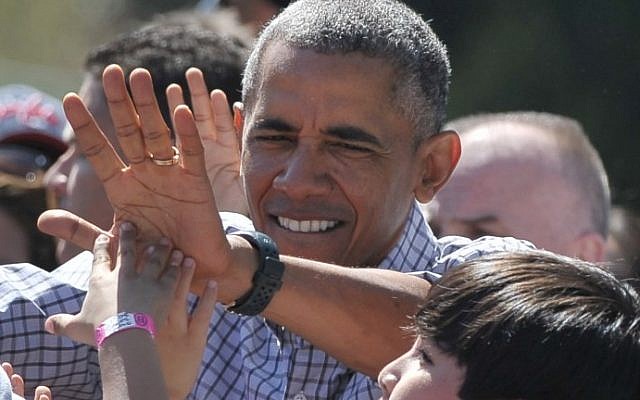 US President Barack Obama greets children on the South Lawn of the White House on April 6, 2015 in Washington, DC. photo credit: AFP/MANDEL NGAN) US President Barack Obama greets children on the South Lawn of the White House on April 6, 2015 in Washington, DC. photo credit: AFP/MANDEL NGAN)
