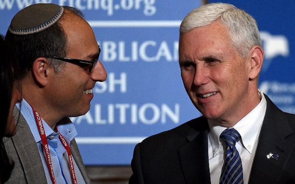 Attendee Bernard Hasten, left, talks with Indiana Gov. Mike Pence after he spoke during the Republican Jewish Coalition spring leadership meeting at The Venetian Las Vegas on April 25, 2015 in Las Vegas, Nevada. (Ethan Miller/Getty Images/AFP)
