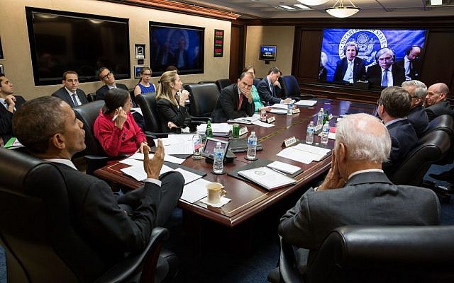 Illustrative: Then US President Barack Obama and Vice President Joe Biden with members of the national security team participate in a secure video teleconference from the Situation Room of the White House with Secretary of State John Kerry, Secretary of Energy Ernest Moniz and the US negotiating team in Lausanne, Switzerland, to discuss the P5+1 negotiations with Iran, March 31, 2015. (White House/Pete Souza) Illustrative: Then US President Barack Obama and Vice President Joe Biden with members of the national security team participate in a secure video teleconference from the Situation Room of the White House with Secretary of State John Kerry, Secretary of Energy Ernest Moniz and the US negotiating team in Lausanne, Switzerland, to discuss the P5+1 negotiations with Iran, March 31, 2015. (White House/Pete Souza)