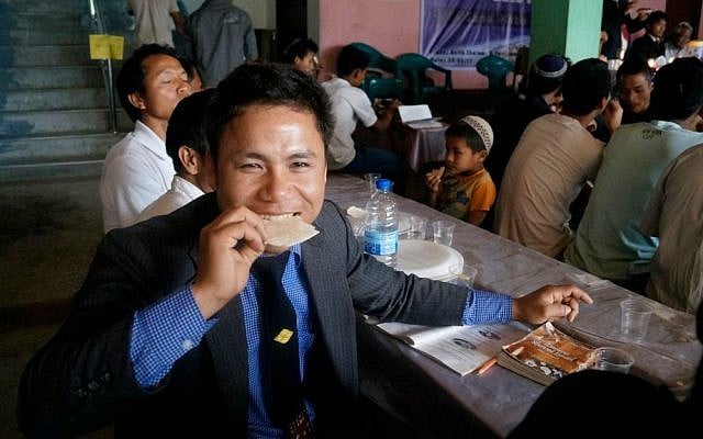 Hundreds of members of the Bnei Menashe community hold a model Passover seder in Churachandpur, in the Indian state of Manipur, Tuesday, March 31, 2015. (Jonathan Haukip/Shavei Israel)