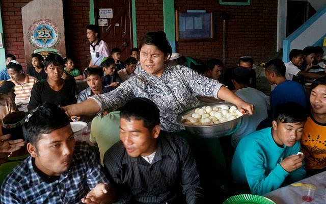 Hundreds of members of the Bnei Menashe community hold a model Passover seder in Churachandpur, in the Indian state of Manipur, Tuesday, March 31, 2015. (Jonathan Haukip/Shavei Israel)