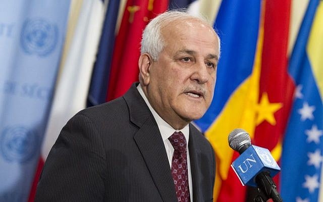 Riyad Mansour speaking to reporters on April 6, 2015. (UN/Loey Felipe)