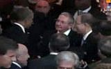 This image from Telesur video shows President Obama sharing a cordial evening handshake with Cuban President Raul Castro during a meeting on the sidelines of the Summit of the Americas Friday evening April 10, 2015 in Panama City, Panama. (photo credit: AP Photo/TeleSUR)