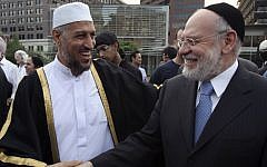 Sheik Imam Mohammed Shchata, left, and Rabbi Albert Gabbi talk during a public assembly for religious tolerance on Septrmbrt 11, 2010, in Philadelphia. Leaders from Christian, Jewish and Muslim communities gathered in front of Philadelphia's Independence Hall on the anniversary of the Sept. 11 terrorism attacks to decry "those who seek to divide us" and reaffirm the America's commitment to religious tolerance. (photo credit: AP Photo/ Joseph Kaczmarek)