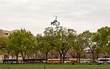A small helicopter lands on the West Lawn of the Capitol in Washington, Wednesday, April 15, 2015.  (photo credit: Sam Smith/AP)