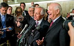Senate Foreign Relations Committee Chairman Sen. Bob Corker and Sen. Ben Cardin speak to reporters on Capitol Hill, Washington, April 14, 2015. (photo credit: AP/Andrew Harnik, File)