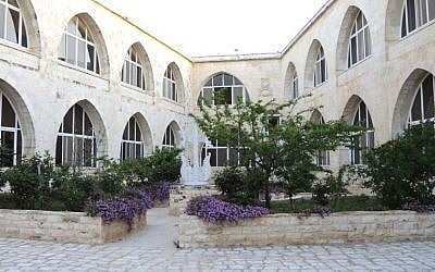 Purple forget-me-not flowers, the symbol of the 100th anniversary of the Armenian Genocide, in a courtyard of the monastery in Jerusalem‘s Old City. (Melanie Lidman/Times of Israel)