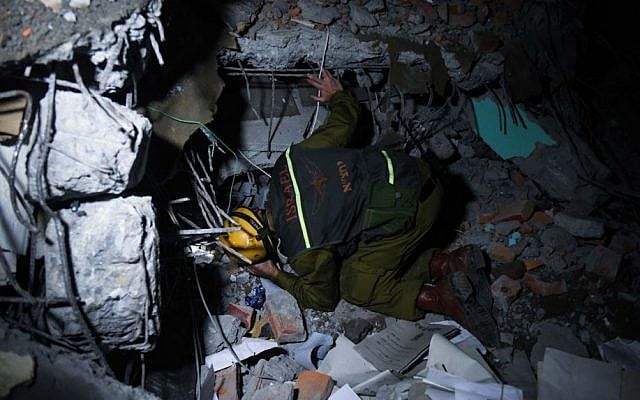 Members of the IDF search and rescue team canvas collapsed buildings to search for survivors in Kathmandu on Tuesday. (photo courtesy: IDF Spokesperson)