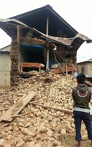 A house damaged in the earthquake that ravaged Nepal in the village of Manegau where Israeli volunteers are working with Tevel B‘Tzedek.  (photo courtesy Tevel B‘Tzedek)
