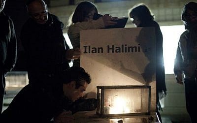 Family and friends attend a memorial ceremony by the grave of 23-year-old Ilan Halimi, at the Givat Shaul cemetery in Jerusalem, February 13, 2013. (photo credit: Tali Mayer/FLASH90) Family and friends attend a memorial ceremony by the grave of 23-year-old Ilan Halimi, at the Givat Shaul cemetery in Jerusalem, February 13, 2013. (photo credit: Tali Mayer/FLASH90)
