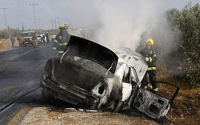 An Israeli car set ablaze by a Molotov Cocktail thrown near the Palestinian village of Tuqua in the West Bank, November 8, 2013 photo credit: Gershon Elinson/Flash90 An Israeli car set ablaze by a Molotov Cocktail thrown near the Palestinian village of Tuqua in the West Bank, November 8, 2013 photo credit: Gershon Elinson/Flash90