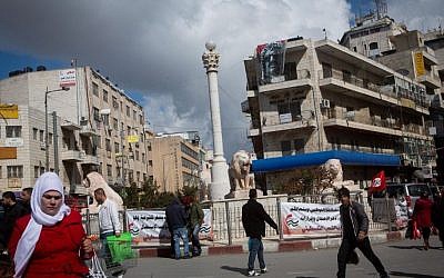 Illustrative photo of Palestinians seen in Manara square at the center of Ramallah, seat of the Palestinian Authority, February 14, 2015. (photo credit: Miriam Alster/FLASH90)