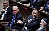 Moshe Kahlon and Yoav Gallant of Kulanu, Aryeh Deri of Shas and Yaakov Litzman of UTJ (from left to right) at the swearing in ceremony for the 20th Knesset, on March 31, 2015. (Miriam Alster/Flash90)