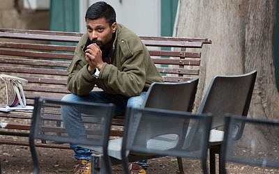 Eran Negauker, 22 of Beersheba, is seen at the Jerusalem Magistrate's Court for remand extension on April 3, 2015, a morning after his friend Niv Assaraf was found in Kiryat Arba after being falsely reported as missing. (Photo credit: Yonatan Sindel/Flash90)