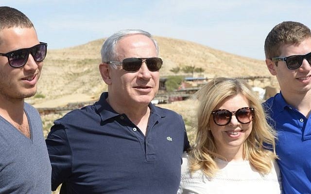 Prime Minister Benjamin Netanyahu and his wife Sara tour southern Israel together with their sons Yair and Avner, on April 8, 2015, during the Jewish holiday of Passover. (Photo creidt:Amos Ben Gershom/GPO)