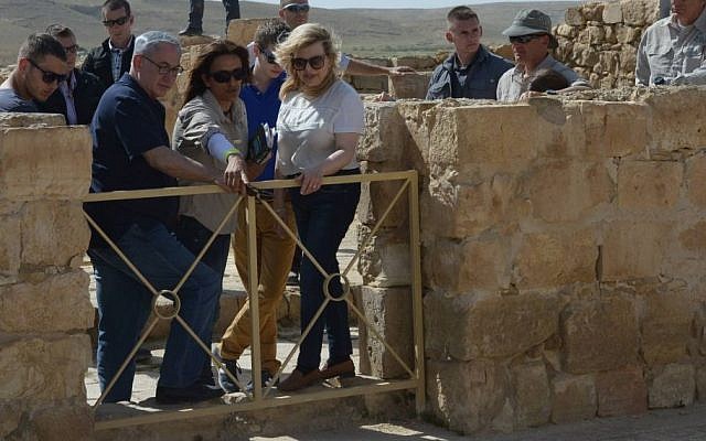 Prime Minister Benjamin Netanyahu and his wife Sara tour southern Israel together on April 8, 2015 together with their sons Yair and Avner, during the Jewish holiday of Passover. (Photo credit: Amos Ben Gershom/GPO)