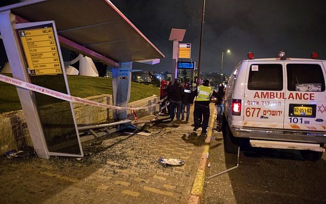 The aftermath of a car-ramming at the French Hill junction in Jerusalem on April 15, 2015 (Yonatan Sindel/Flash90) The aftermath of a car-ramming at the French Hill junction in Jerusalem on April 15, 2015 (Yonatan Sindel/Flash90)