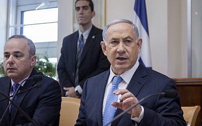 Prime Minister Benjamin Netanyahu seen at the weekly cabinet meeting in Jerusalem on April 19, 2015. (photo credit: Olivier Fitoussi/POOL)