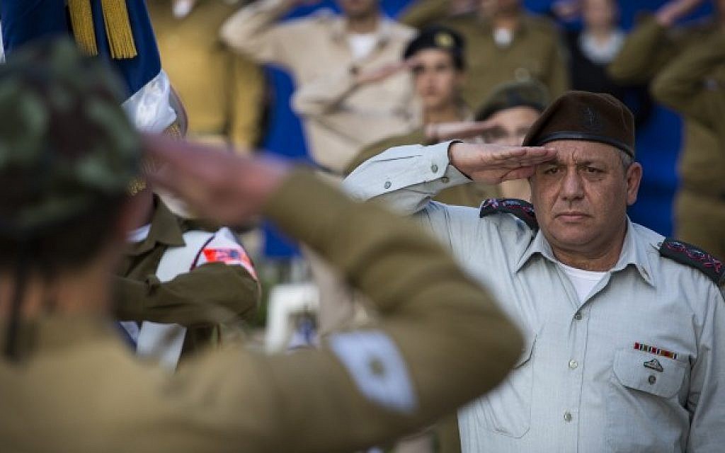IDF Chief of Staff Gadi Eizenkott salutes during the flag laying ceremony at Mount Herzl Military Cemetery in Jerusalem, on April 19, 2015 (Photo credit: Hadas Parush/Flash90)