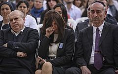 Jewish Agency Chairman Natan Sharansky, Valérie Braham, the widow of Phillip Barham who was killed in Paris,  and Sergeot Uzan, the father of Dan Uzan killed in Copenhagen, attend a ceremony in Jerusalem on April 22, 2015, commemorating victims of anti-Semitic attacks in the world. (Photo credit: Hadas Parush/Flash90)