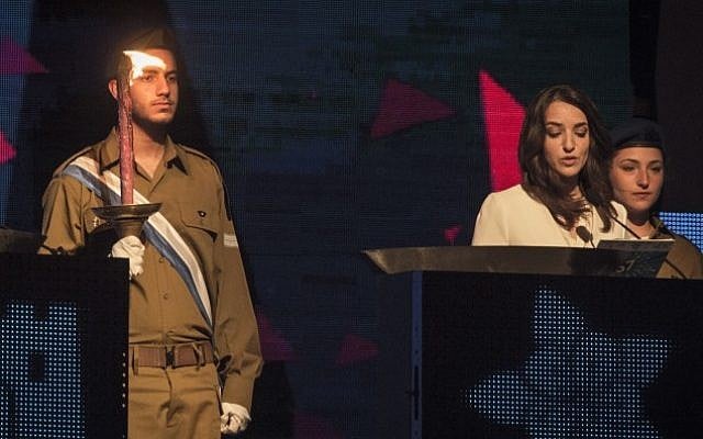 Arab Israeli journalist Lucy Aharish lights a ceremonial torch during the Israeli 67th Independence Day Ceremony at Mount Herzl in Jerusalem on April 22, 2015. (Photo credit: Hadas Parush/Flash 90) Arab Israeli journalist Lucy Aharish lights a ceremonial torch during the Israeli 67th Independence Day Ceremony at Mount Herzl in Jerusalem on April 22, 2015. (Photo credit: Hadas Parush/Flash 90)