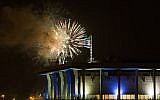 Fireworks from the Mount Herzl ceremony seen over the Knesset in Jerusalem, marking the beginning of the celebrations of Israel's 67th Independence Day, on April 22, 2015. (photo credit: Yonatan Sindel/Flash90)