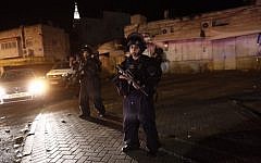 Israeli Police at the scene where several policemen were run over by an alleged drive-by terrorist near the Arab neighborhood of A-Tur in East Jerusalem, on April 25, 2015. (Photo credit: Yonatan Sindel/Flash90)