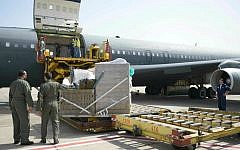 Loading an aircraft with rescue equipment at Ben Gurion International Airport, as the IDF aid delegation prepares to board a plane to Nepal. April 27, 2015. (IDF Spokesperson)
