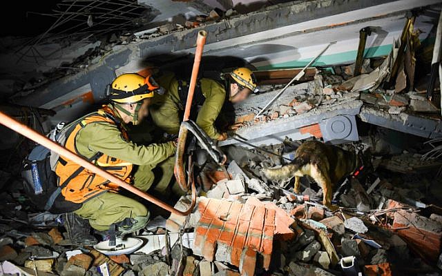 Israeli soldiers during rescue attempts of injured and trapped people from the ruins of buildings in Nepal, following the deadly earthquake.on April 28, 2015. (photo credit: IDF Spokesperson) Israeli soldiers during rescue attempts of injured and trapped people from the ruins of buildings in Nepal, following the deadly earthquake.on April 28, 2015. (photo credit: IDF Spokesperson)