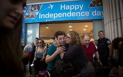 Families and friends greet Israeli travelers who arrived on an Israeli rescue plane from Nepal to Ben-Gurion International airport near Tel Aviv on April 28, 2015. (Photo credit: Miriam Alster/FLASH90) Families and friends greet Israeli travelers who arrived on an Israeli rescue plane from Nepal to Ben-Gurion International airport near Tel Aviv on April 28, 2015. (Photo credit: Miriam Alster/FLASH90)