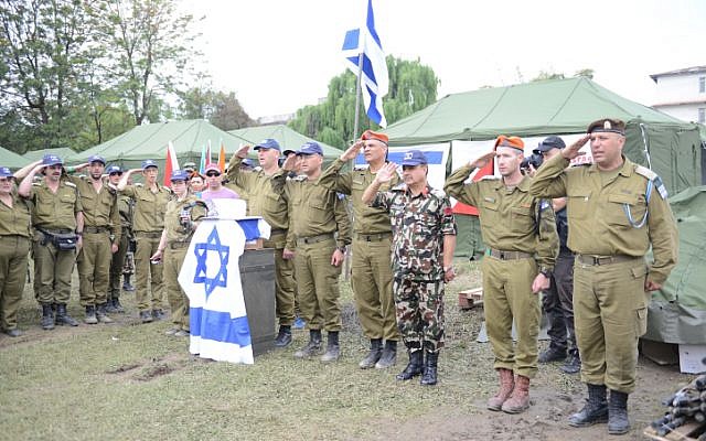 Israeli and Nepalese soldiers set up a field hospital in Kathmandu on April 29, 2015 after a deadly earthquake struck the Nepalese capital. (photo credit: IDF Spokesperson) Israeli and Nepalese soldiers set up a field hospital in Kathmandu on April 29, 2015 after a deadly earthquake struck the Nepalese capital. (photo credit: IDF Spokesperson)