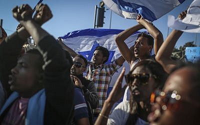 Demonstrators protest outside the National Police Headquarters in Jerusalem against violence and racism directed at Israelis of Ethiopian descent (photo credit: April 30, 2015. Photo by Hadas Parush/ FLASH90)