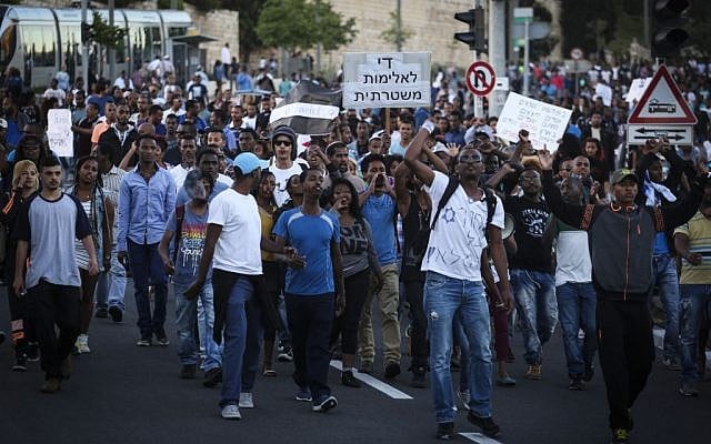 Hundreds of Israeli-Ethiopians protest outside the Police Headquarters in Jerusalem, against violence and racism directed at Israelis of Ethiopian descent, following a video clip released a few days ago showing police beating up an IDF soldier from the Ethiopian community. April 30, 2015. (photo credit: Hadas Parush/FLASH90)