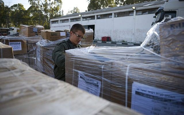 A soldier prepares equipment and supplies for the IDF's delegation to Nepal at the Tel Hashomer army base in Ramat Gan on April 26, 2015. (Photo credit: Gadi Yampel/IDF Spokesperson) A soldier prepares equipment and supplies for the IDF's delegation to Nepal at the Tel Hashomer army base in Ramat Gan on April 26, 2015. (Photo credit: Gadi Yampel/IDF Spokesperson)