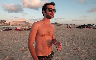 Guy Trichter, 27, at Habonim Beach, lives in Tel Aviv:
"The 'country'... It's just some lines they drew on a map 80 years ago." (Photo credit: Judith Hertog)