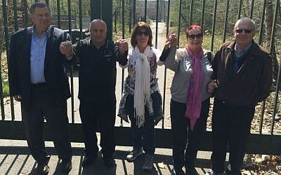 Bergen-Belsen 'babies' in front of Glyn Hughes Hospital at DP camp where they were born. From left: Yaakov Zilbershatz, Pinchas Dreilinger, Pirchia (Bluma) Barak, Aviva Tal and Joe Laufer. April 24, 2015, Bergen-Belsen, Germany (photo credit: Renee Ghert-Zand/Times of Israel) Bergen-Belsen 'babies' in front of Glyn Hughes Hospital at DP camp where they were born. From left: Yaakov Zilbershatz, Pinchas Dreilinger, Pirchia (Bluma) Barak, Aviva Tal and Joe Laufer. April 24, 2015, Bergen-Belsen, Germany (photo credit: Renee Ghert-Zand/Times of Israel)