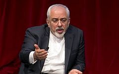 Iran's Foreign Minister Mohammad Javad Zarif is interviewed by David Ignatius of the Washington Post, during his appearance, hosted by the Center on International Cooperation, at New York University, Wednesday, April 29, 2015. (Photo credit: AP/Richard Drew)