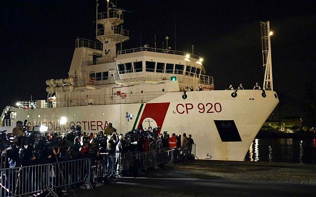 Italian Coast Guard ship Bruno Gregoretti, carrying survivors of the boat that overturned off the coasts of Libya Saturday, arrives at Catania Harbor, Italy, Monday, April 20, 2015. (AP Photo/Carmelo Imbesi) Italian Coast Guard ship Bruno Gregoretti, carrying survivors of the boat that overturned off the coasts of Libya Saturday, arrives at Catania Harbor, Italy, Monday, April 20, 2015. (AP Photo/Carmelo Imbesi)