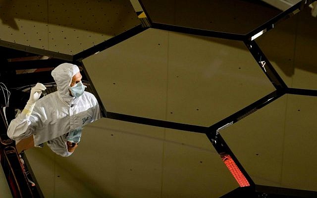 Six of the 18 Webb telescope mirrors are readied for shipment. All of the 18 mirror segments will be cryogenically tested twice in the Marshall Center's X-ray & Cryogenic Facility -- once with bare polished beryllium and then again after a thin coating of gold is applied to gain optimal reflectance in the infrared. (NASA/MSFC/David Higginbotham/Emmett Given/Wikipedia)