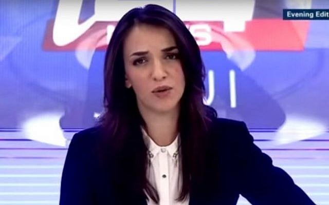 Lucy Aharish hosts the evening edition on i24news photo credit: YouTube image Lucy Aharish hosts the evening edition on i24news photo credit: YouTube image