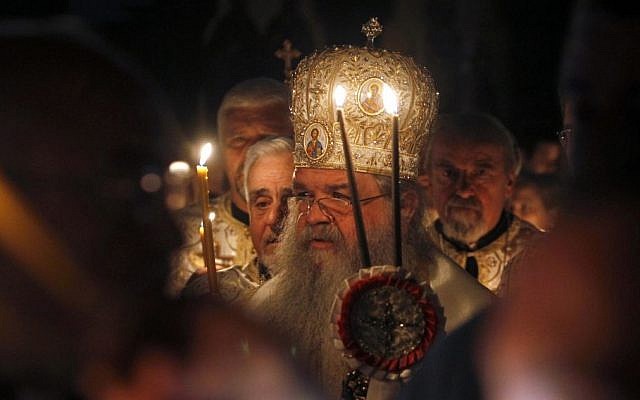 Macedonian Christian Orthodox Archbishop Stefan participates in a procession at St. Clement Christian Orthodox church in Macedonia's capital Skopje, during Easter service, April 12, 2015. (photo credit: AP/Boris Grdanoski)